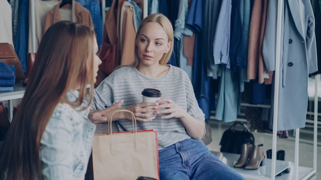 retail staff and store manager having a conversation